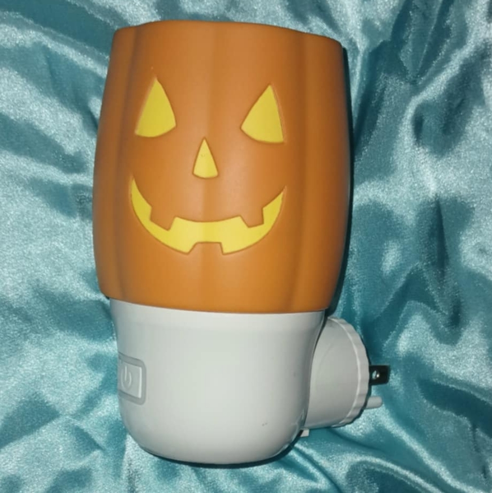 Plug in air freshener